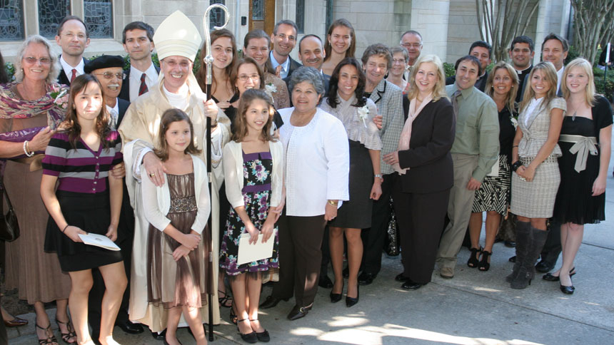 The Zarama family gathers in Atlanta for Bishop Luis Zarama’s ordination to bishop in 2009. Maria Teresa Zarama, his mother, is pictured at far left with her husband, Rafael, next to her.