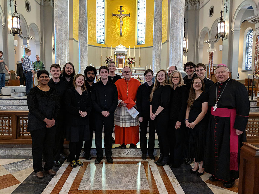 Jeff Rice, back row and third from right, travels with the Liturgical Choir of N.C. State Catholic Campus Ministry. Here, they're pictured with Bishop Richard Stika (right) and Cardinal Justin Rigali (center) at Sacred Heart Cathedral in Knoxville, Tennessee.