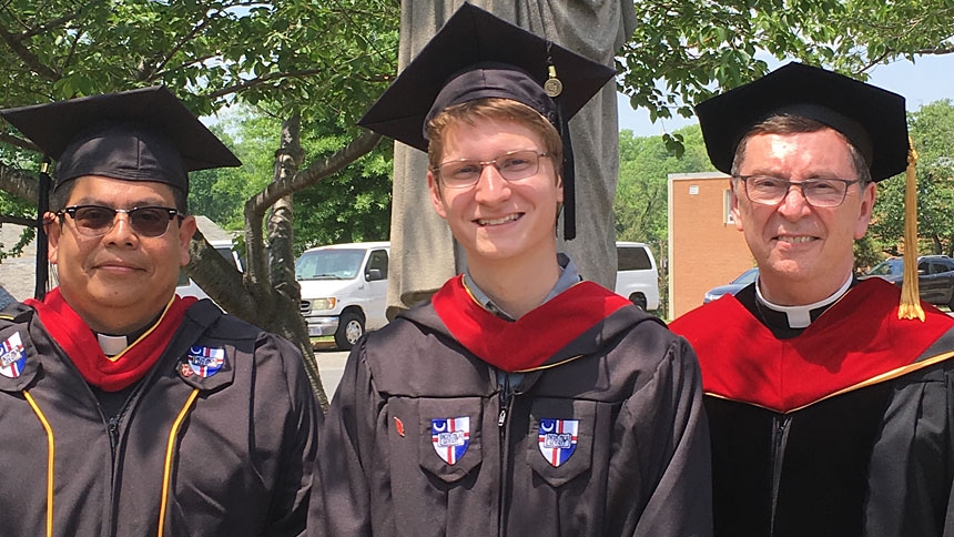 In 2018, Fr. Rafael León of the diocesan Marriage Tribunal received a licentiate in Canon Law and Mr. Christopher Neyhart of St. Thomas More in Chapel Hill received a bachelor's degree in Theology. They are with Rev. Monsignor Michael Clay, associate dean and associate professor in the School of Theology and Religious Studies.