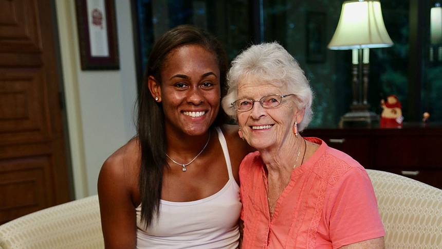 Abbey Forbes, 18, sits with Joan Monti, 80, at the Catholic Center in Raleigh July 22. The two women sat down with NC Catholics magazine to discuss faith, friendship and Forbes' Wimbledon championship. Credit: by Kate Turgeon Watson