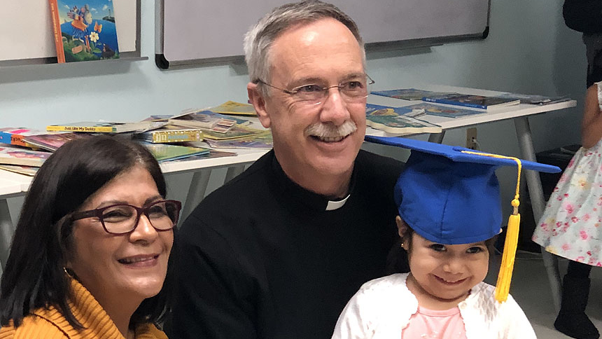 Bishop delivers graduation message to young readers and their parents