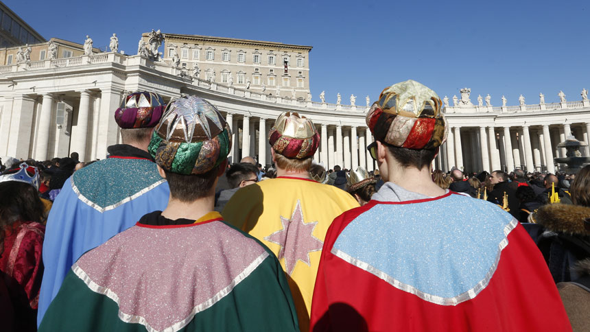 Children dressed as the Magi attend the Angelus led by Pope Francis from the window of his studio overlooking St. Peter's Square at the Vatican Jan. 1, 2020. 