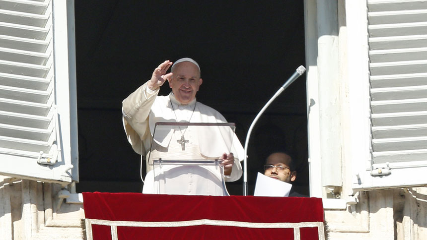 Pope Francis greets the crowd as he leads the Angelus from the window of his studio overlooking St. Peter's Square at the Vatican Jan. 1, 2020. (CNS photo/Paul Haring)