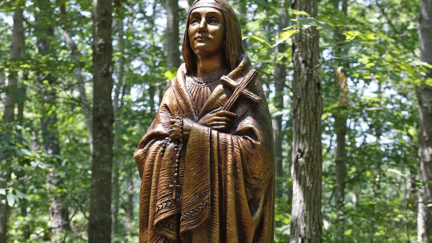 A statue of St. Kateri Tekakwitha is seen at Our Lady of the Island Shrine in Manorville, N.Y. The saint's feast day is celebrated July 14 in the U.S. and April 17 in Canada. (CNS photo/Gregory A. Shemitz)