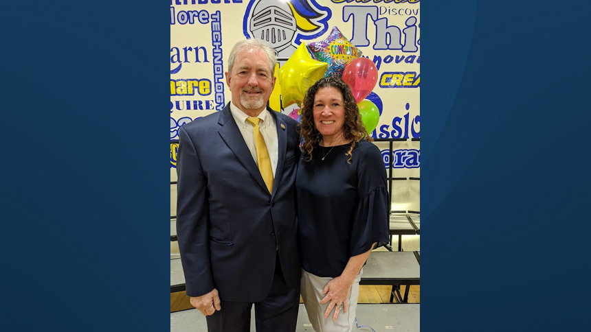 Kelly Champion, recipient of the 2021-2022 Lewis Award for Excellence in Teaching, is pictured with her husband Rick.