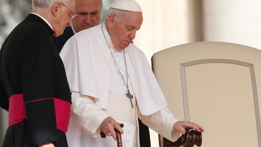 Pope Francis arrives at his chair during his general audience in St. Peter's Square at the Vatican June 22, 2022. (CNS photo/Paul Haring)