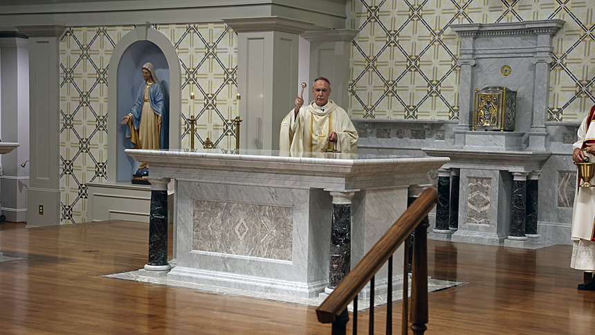 New altar is blessed to celebrate 25th anniversary of church building at St. Michael.