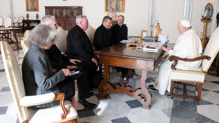 Pope Francis meets with leaders of the Synod of Bishops' general secretariat in the library of the Apostolic Palace at the Vatican Oct. 14, 2022. Two days later, the pope announced there would be sessions of the Synod of Bishops in 2023 and 2024. (CNS photo/Vatican Media)