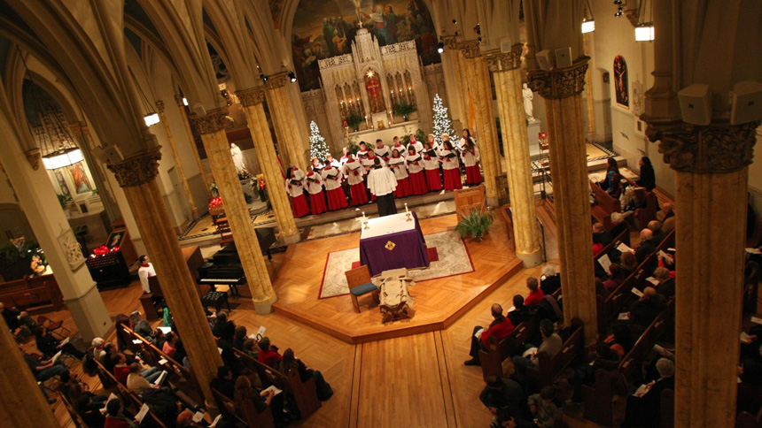 Members of the choir sing Christmas hymns, such as "O Come, O Come, Emmanuel," at St. Malachy's Church in New York. During Advent, we should ask ourselves what part we are playing in the journey to Christ's birth. (CNS photo/Gregory A. Shemitz)