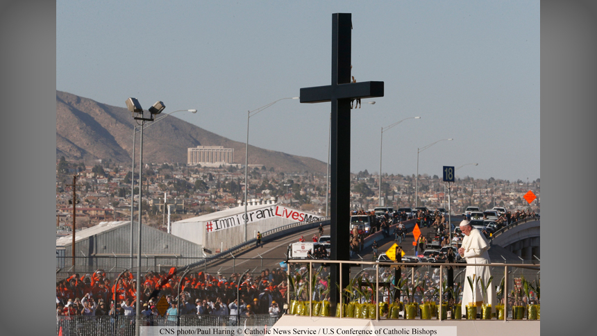 Pope Francis prays at a cross on the border between El Paso, Texas, and Ciudad Juárez, Mexico, before celebrating Mass Feb. 17, 2016. The pope has made migration, a dominant social issue in Latin America, a central theme of his pontificate. (CNS photo/Paul Haring)