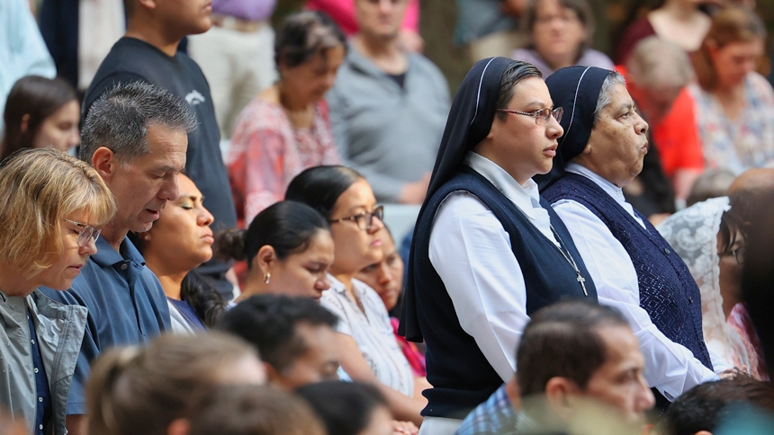 Carrying the Eucharist: St. Michael Parish holds procession at sunset