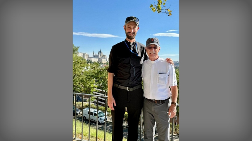 Father Michael Schuetz and Bishop Luis Zarama; skyline shows the Catedral de la Almudena in Madrid, Spain