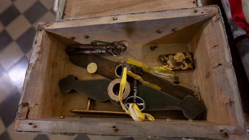 The keys, a handle and other hardware for the Holy Door of St. Peter's Basilica at the Vatican are seen Dec. 2, 2024, after a ceremony in which the box they were in was removed from the wall sealing the door. Pope Francis will open the door and inaugurate the Holy Year 2025 on Christmas Eve. (CNS photos/Vatican Media)