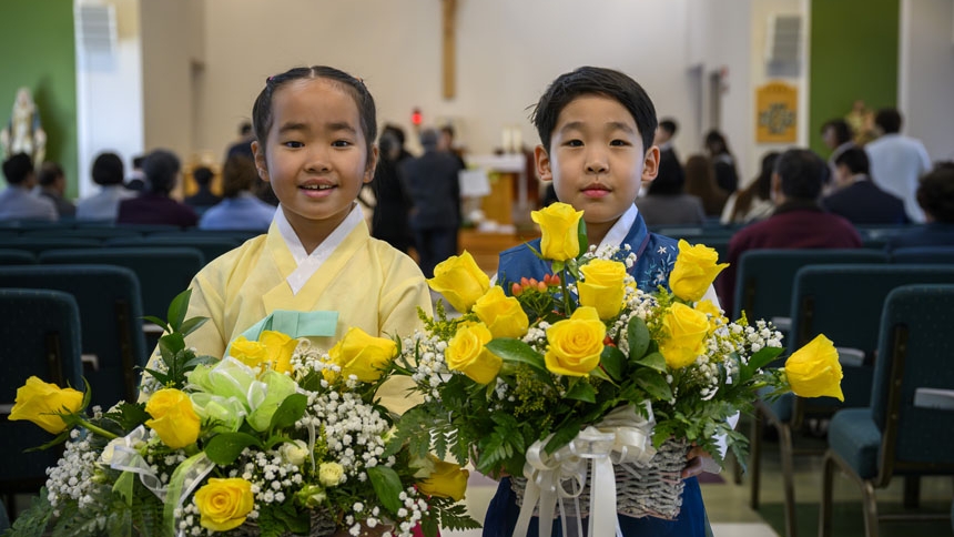 Bishop confirms 26 at St. Ha Sang Paul Jung