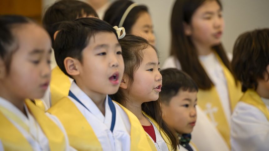 Bishop confirms 26 at St. Ha Sang Paul Jung