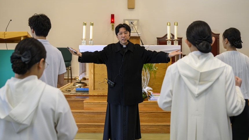 Bishop confirms 26 at St. Ha Sang Paul Jung