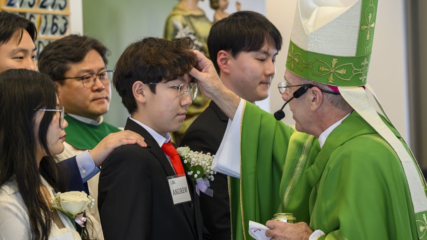 Bishop confirms 26 at St. Ha Sang Paul Jung