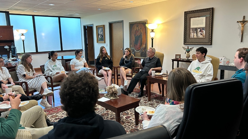 The students and Bishop Luis talked about many topics, including the town where he was born in Colombia, theology and sports.
