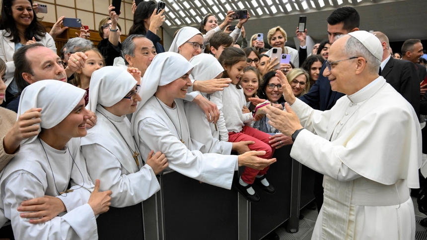 Pope Leo XIV greets religious sisters during a meeting with officials and employees of the Roman Curia, Vatican City State and the Diocese of Rome in the Paul VI Audience Hall at the Vatican May 24, 2025. (CNS photo/Vatican Media)