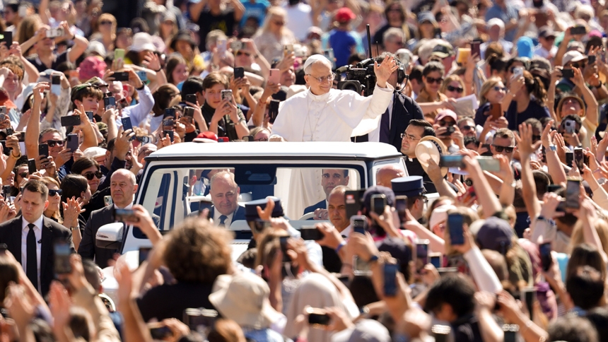 Pope Leo XIV greets visitors as he rides the popemobile around St. Peter’s Square at the Vatican May 28, 2025, ahead of his second weekly general audience. (CNS photo/Lola Gomez)