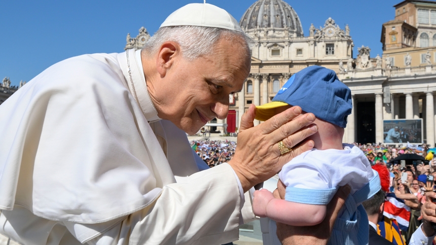 Pope Leo XIV greets a child as he rides in the popemobile before celebrating Mass in St. Peter’s Square at the Vatican June 1, 2025, as part of the Jubilee of Families, Children, Grandparents and the Elderly. (CNS photo/Vatican Media)