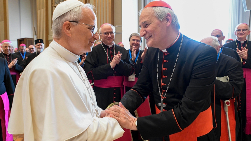 Pope Leo XIV greets Cardinal Matteo Zuppi of Bologna, president of the Italian bishops' conference, during a meeting with about 200 conference members in the Hall of Blessings at the Vatican June 17, 2025. (CNS photo/Vatican Media)