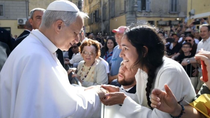 Pope Leo XIV greets a young woman along the streets of Albano, Italy, before offering Mass in the Cathedral Basilica of St. Pancras near Castel Gandolfo on July 20, 2025. Credit: Vatican Media