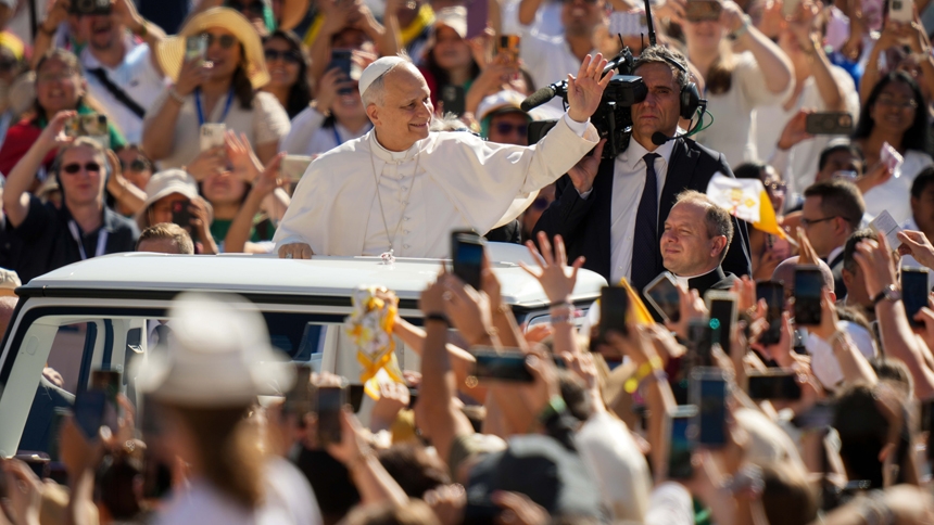 Pope Leo XIV greets visitors and pilgrims from the popemobile as he rides around St. Peter's Square at the Vatican before his weekly general audience July 30, 2025. (CNS photo/Lola Gomez)