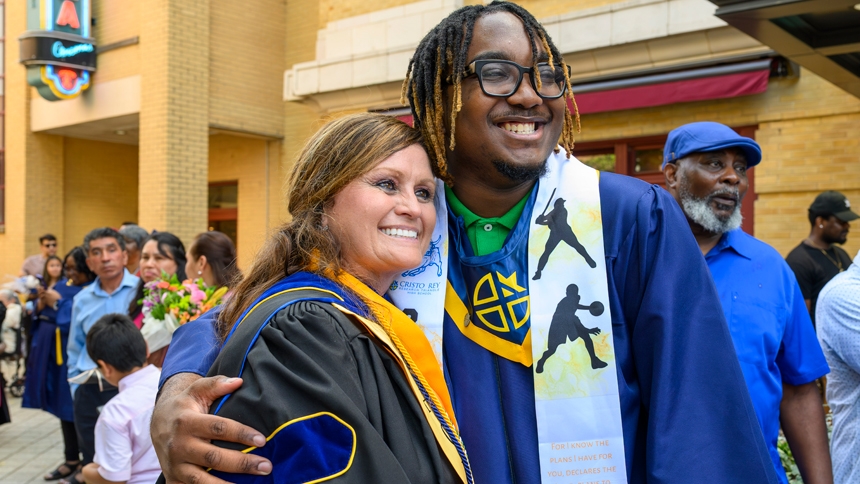 Graduates and educators gathered outside the Carolina Theatre in Durham after graduation.