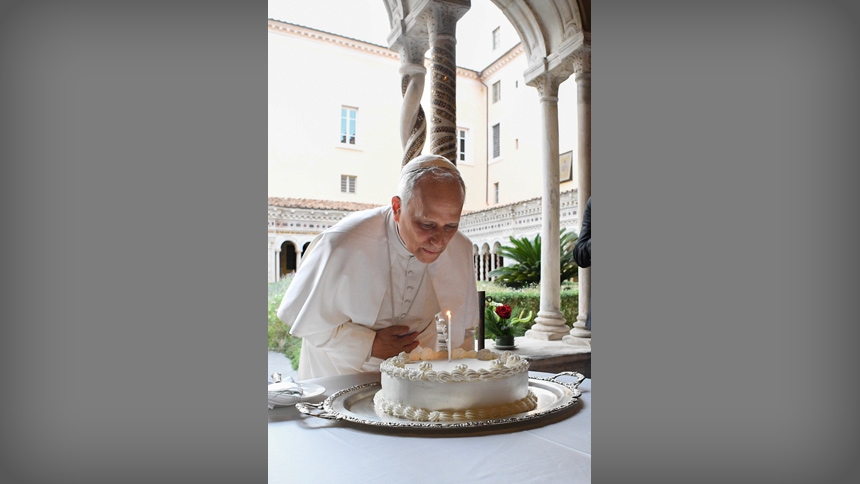 Pope Leo XIV blows out a candle on a cake for his 70th birthday Sept. 14, 2025, as cardinals, Vatican officials and ecumenical leaders look on after a prayer service at Rome's Basilica of St. Paul Outside the Walls. (CNS photo/Vatican Media)