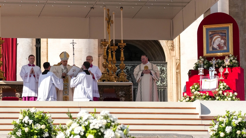 Pope Leo XIV reads the canonization formula declaring seven blessed saints in St. Peter’s Square at the Vatican Oct. 19, 2025. (CNS photo/Lola Gomez)