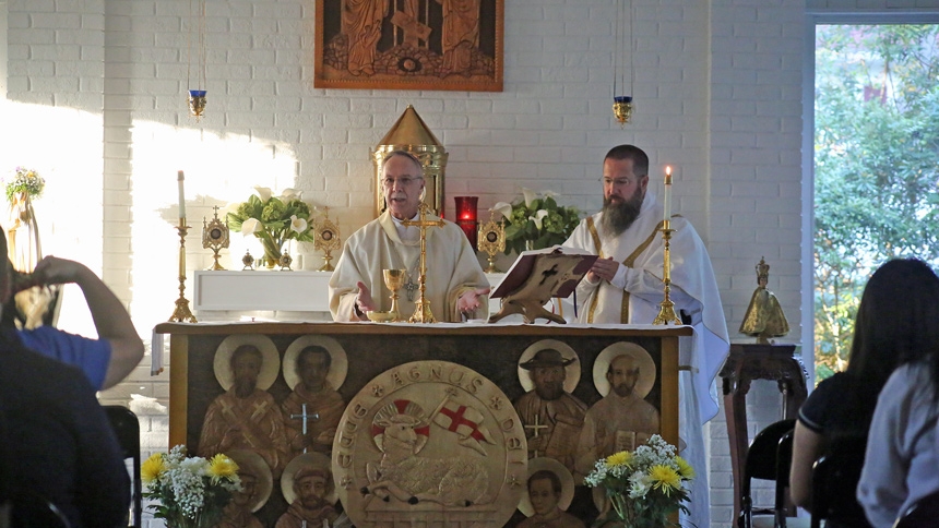'One foot in Heaven': Bishop inspires students during visit to ECU Newman Center