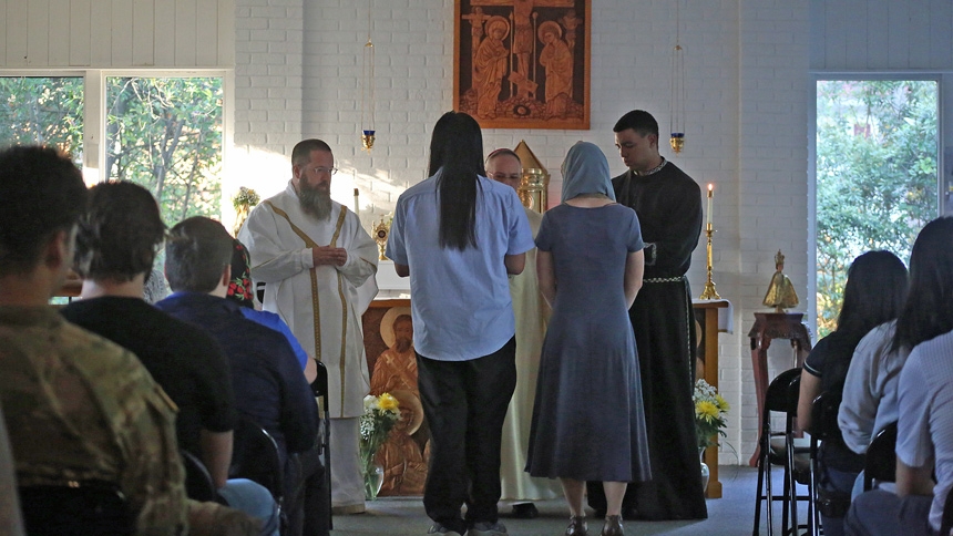 'One foot in Heaven': Bishop inspires students during visit to ECU Newman Center