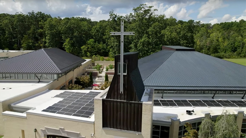 Solar panels atop the roof of St. Thomas More Catholic Church in Chapel Hill, NC