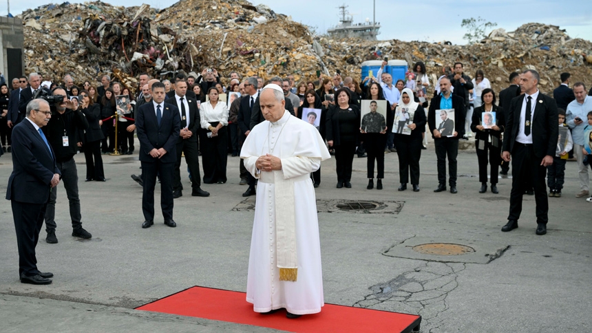 Standing amid the rubble and with the loved ones of people killed behind him, Pope Leo XIV prays at a memorial marking the site of a deadly explosion in 2020 at the port in Beirut Dec. 2, 2025. (CNS photo/Vatican Media)