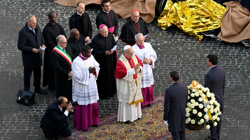 Pope Leo XIV blesses a basked of white roses to leave at the base of a statue of Mary near the Spanish Steps in the center of Rome Dec. 8, 2025, the feast of the Immaculate Conception. (CNS photo/Vatican Media)