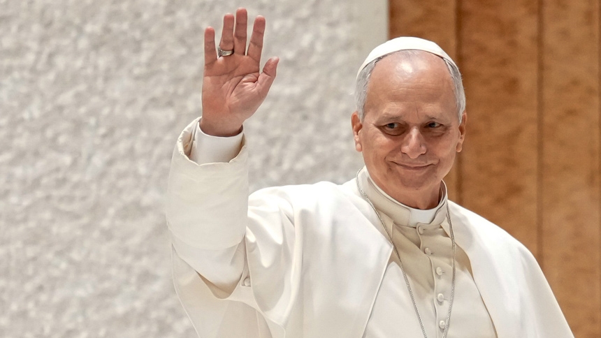 Pope Leo XIV greets pilgrims and visitors as he enters the Paul VI Audience Hall for his weekly general audience at the Vatican Jan. 21, 2026. (CNS photo/Lola Gomez)