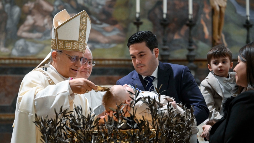 Pope Leo XIV baptizes a baby during Mass in the Sistine Chapel at the Vatican, Jan. 11, 2026, the feast of the Baptism of the Lord. (CNS photo/Vatican Media)