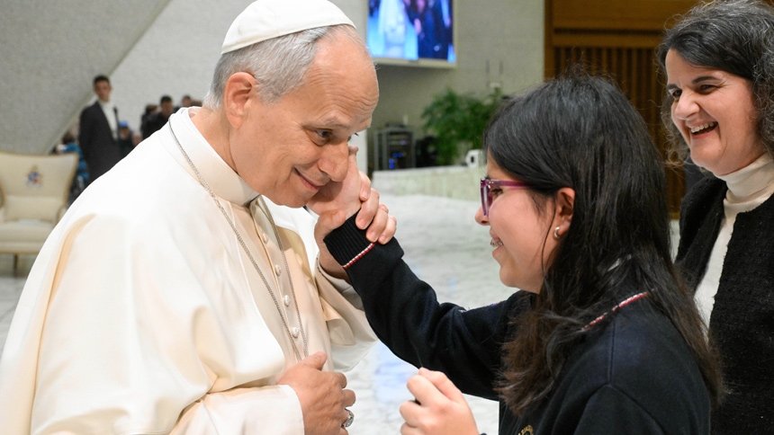 Pope Leo XIV greets people at the conclusion of his weekly general audience in the Paul VI Audience Hall at the Vatican Jan. 14, 2026. (CNS photo/Vatican Media)