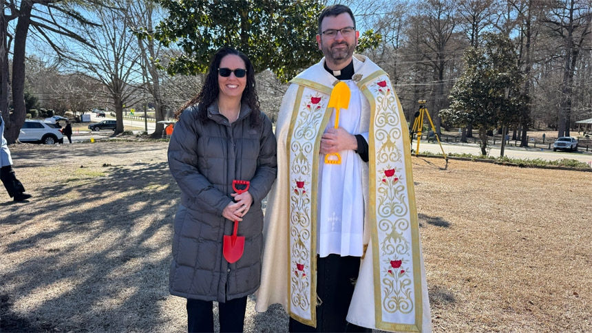 Father James Magee and Principal Debbie Sommer
