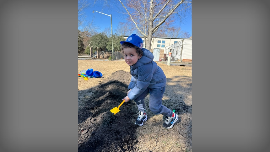Hayes Lewis, a student in PK3, participates in the groundbreaking. 