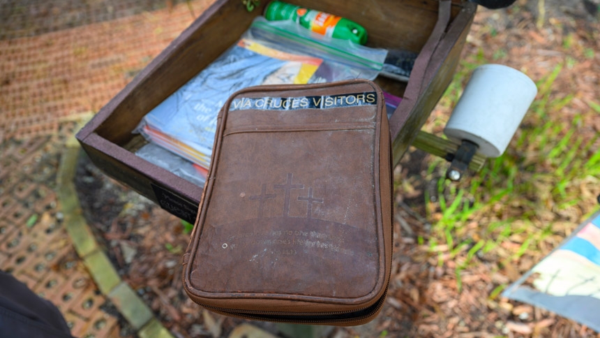 At the St. Stanislaus outdoor prayer area, which includes Stations of the Cross, a case holds a visitors’ book that originated with the stations’ first caretaker, Dr. Richard Tamisiea.  