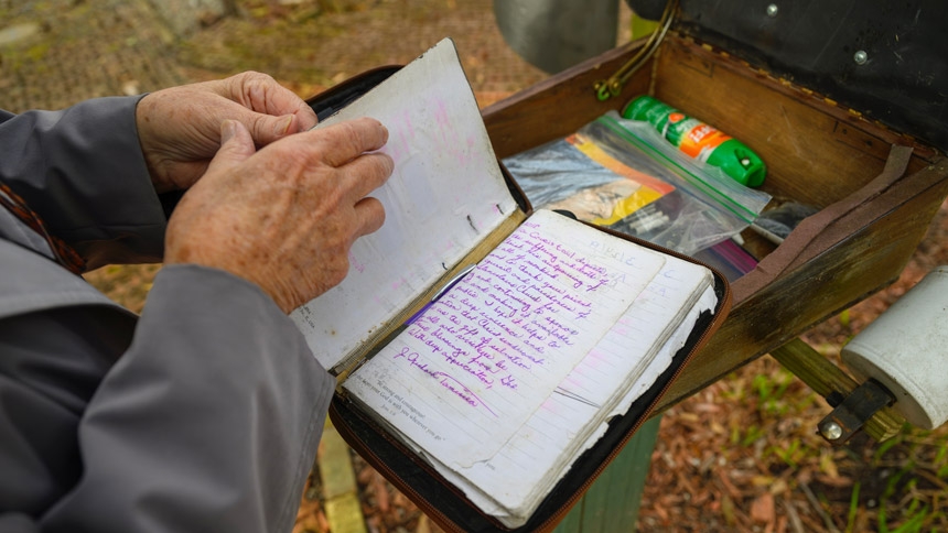 Joyce Lemon shares the visitors’ book with NC Catholics magazine. 