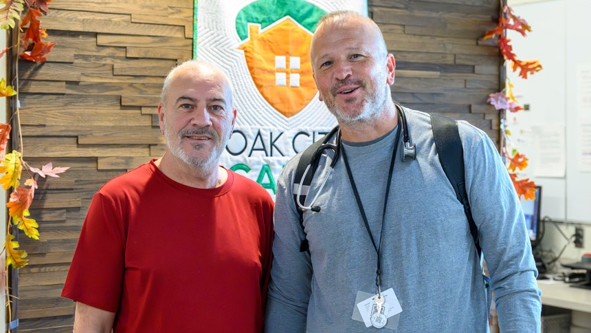 Rick Godette (left), a coordinated care support specialist and team lead at Oak City Cares in Raleigh, stands with Brian Klausner, a physician who serves unhoused patients, April 22 in Raleigh. 