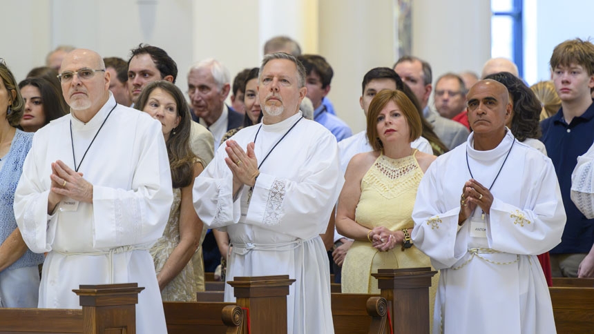 Left to right, in white: Thomas Costello, Joseph Longo and Antonio Enrique Rodriguez.