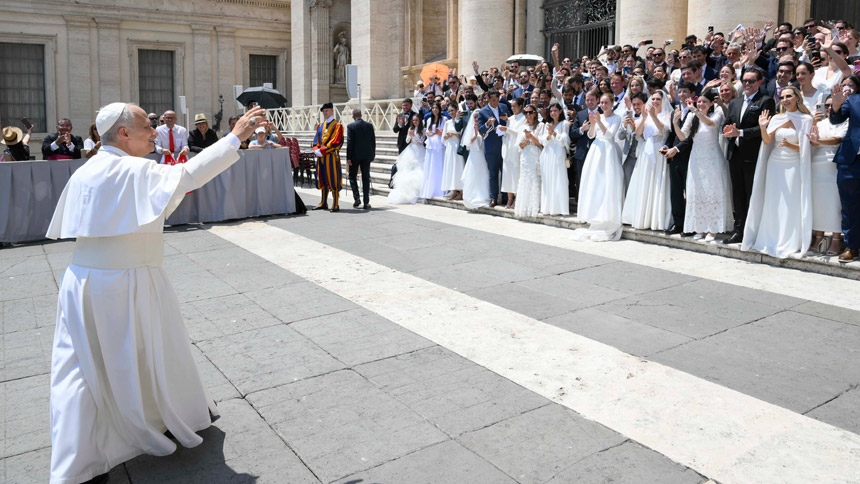 Pope Leo XIV greets newly married couples at St. Peter’s Square at the Vatican after his weekly general audience June 24, 2026. (CNS photo/Vatican Media)