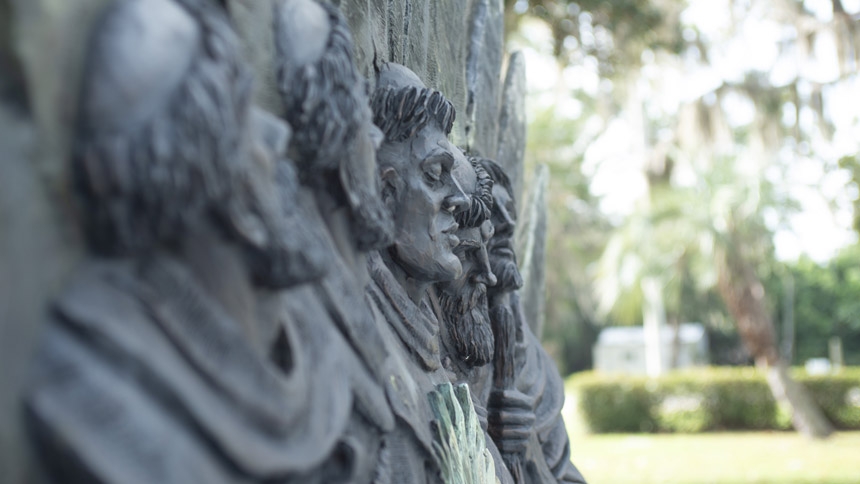 A detailed view of the bronze relief sculpture by Timothy Schmalz, dedicated to Friar Pedro de Corpa and his four Franciscan companions. Located in Darien, Georgia, the monument honors the "Georgia Martyrs" ahead of their historic October 31, 2026 beatification.