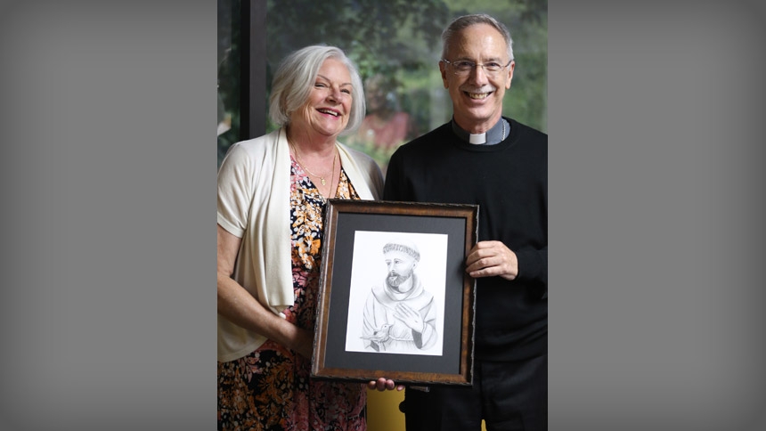 Artist Jo Lawson and Bishop Luis smile for a photo Aug. 13 in Raleigh.