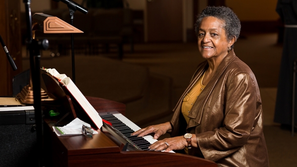 Gloria Burton works in music ministry at Durham's Holy Cross Parish, which is known for its upbeat, intimate and emotionally rich gospel music.