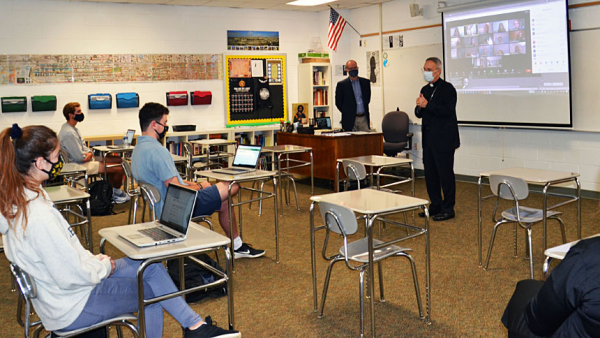 Bishop fields students' questions during Gibbons visit
